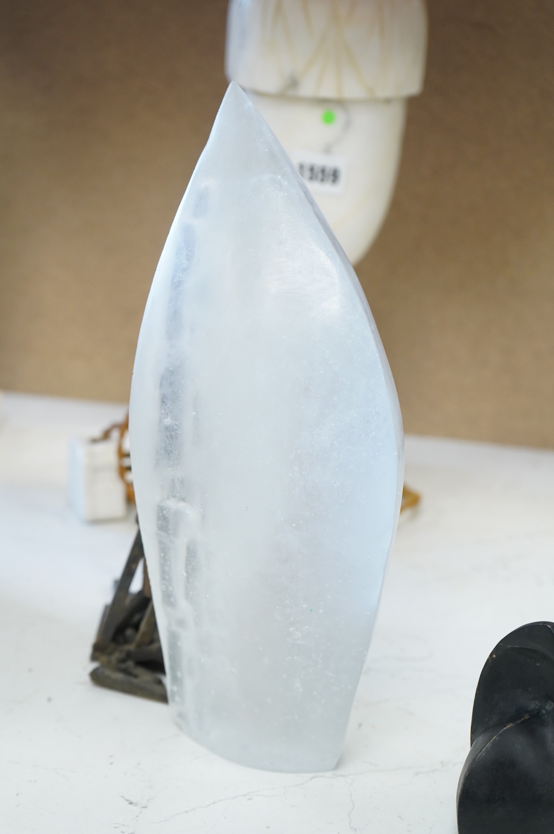 A contemporary Brutalist style glass and iron sculpture and two bronzes signed 'VA', 27cm